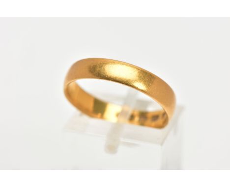 A 22CT GOLD BAND RING, a soft courted band ring approximate width 4mm, approximate depth 1mm, ring size P leading edge, hallm