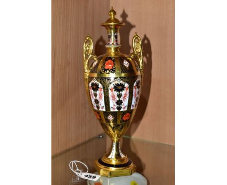 A ROYAL CROWN DERBY IMARI 1128 SOLID GOLD BAND TWIN HANDLED VASE AND FIXED COVER, short pedestal and canted square foot, bear