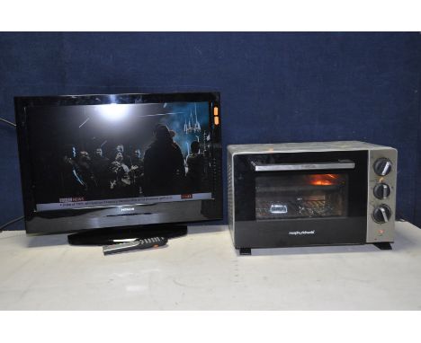 A HITACHI 26in TV model No L26DN04U with remote and a Morphy Richards rotisserie mini oven model No KR-F20RL-E1DKH (both PAT 