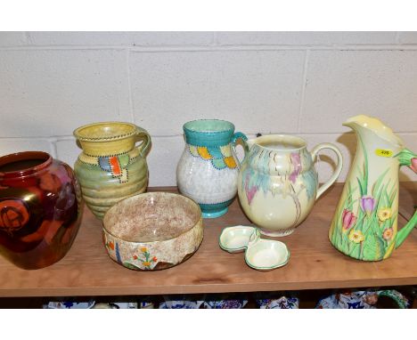 SEVEN PIECES OF 20TH CENTURY DECORATIVE CERAMICS INCLUDING CROWN DUCAL, comprising two Carlton Ware jugs, one moulded with Cr