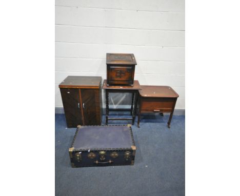 A VINTAGE TRAVELLING SUITCASE, mahogany sewing box, mahogany cased treadle sewing machine/cabinet, oak slipper box and an occ