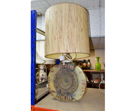 A BERNARD ROOKE STONEWARE TABLE LAMP, of large circular slab-built form with applied and impressed decoration, with relief st