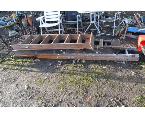 A WOODEN DOUBLE EXTENSION LADDER and two wooden step ladders longest being 270cm long for each extension
