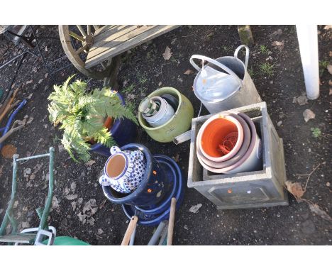 A VINTAGE GALVANISED WATERING CAN and seventeen plant pots including two square composite pots largest being 32cm sq.