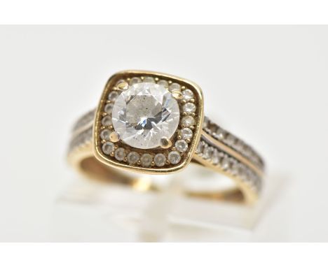 A 9CT GOLD CUBIC ZIRCONIA RING,  a circular cut cubic zirconia, set within a squared halo of circular cut cubic zirconia, lea