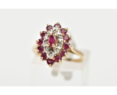 A 9CT GOLD RUBY AND DIAMOND CLUSTER RING, slightly raised cluster of a navette form, set with a central marquise cut ruby, si