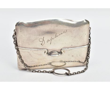 AN EARLY 20TH CENTURY SILVER PURSE, a hard silver purse with a spring hinged fold, engraved with the name 'Daphnie', fitted w