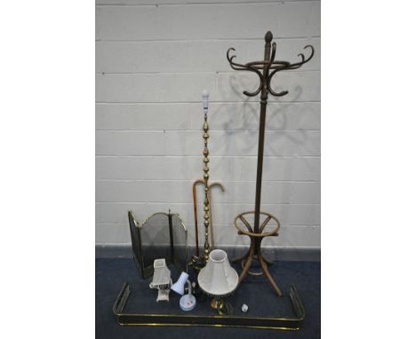 A BENTWOOD STYLE BEECH HAT STAND, along with a brass standard lamp, folding fire screen, brass fender, two walking sticks and