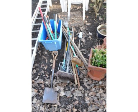 A WHITE PLASTIC GARDEN TABLE 73cm square, four matching chairs and a collection of garden tools