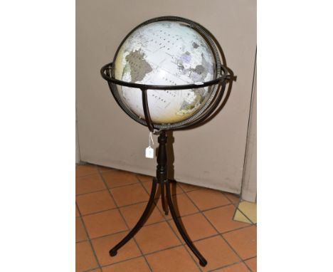 A MODERN GLOBE ON A METAL STAND, standing on three feet, dated 2008, total height approximately 83cm (Condition report: globe