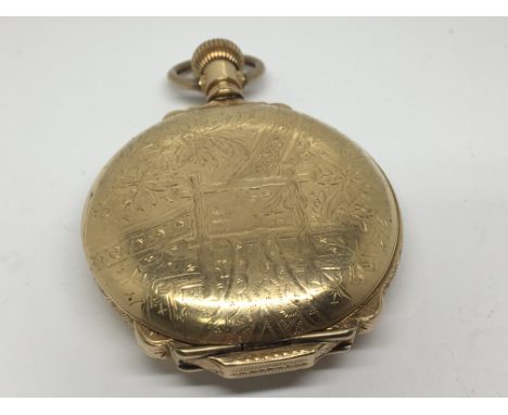 An Early 20th century decorative hunter pocket watch. With button wind working order