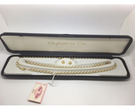 A gold plated pearl necklace, bracelet and earring set
