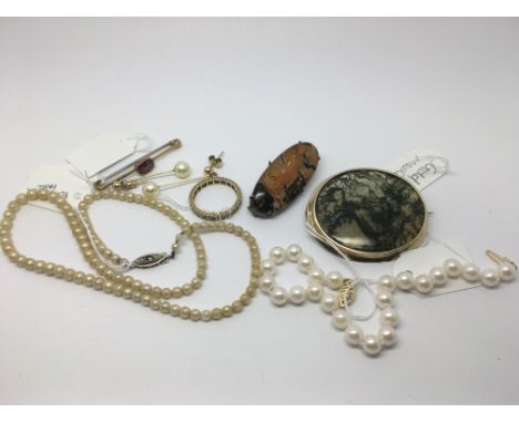 A moss agate brooch and one other, two pearl necklaces, a ring, a garnet brooch and other oddments.