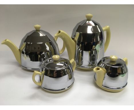 A four piece chrome and ceramic Heatmaster tea and coffee set.