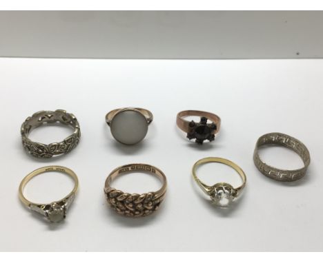 Seven rings including an 18ct.plat solitaire and a 9ct gold keeper ring