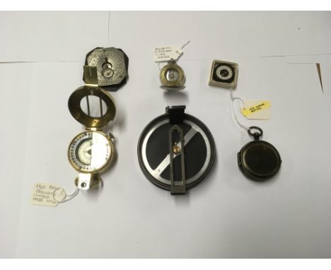 A collection of 6 compasses to include a Thomas Glauser 1942 compass, a barker 1870 hunter compass and Nigretti &amp; Zambra 