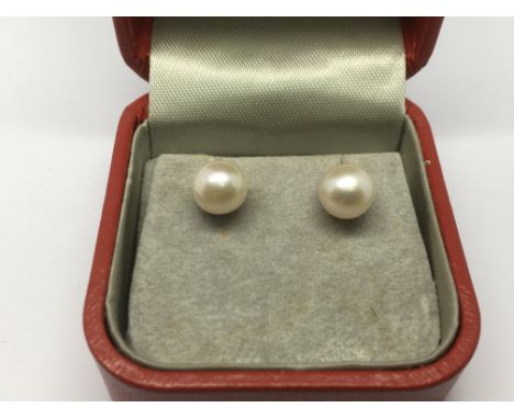 A pair of 9ct gold cultured pearl earrings.