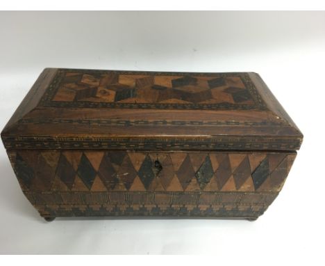 A parquetry tea caddy with fitted interior.Approx 15x30cm, a/f
