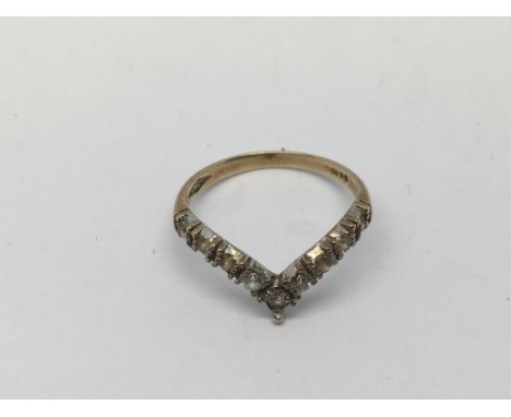 A 9ct gold diamond wishbone ring set with bright cut diamonds, approx 1.61g and approx size N.