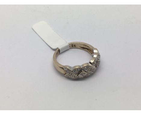 A 9ct gold two tone diamond set kiss ring, approx 3.8g and approx size L-M.