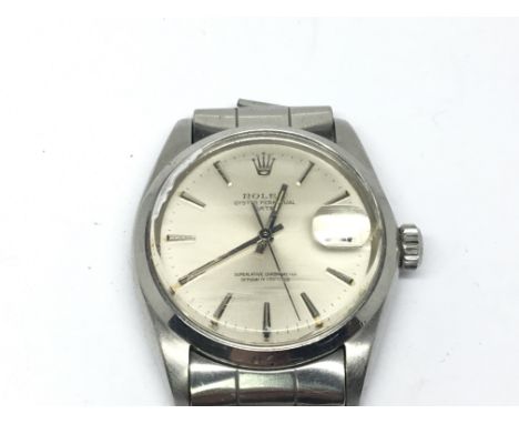 A Vintage Rolex Stainless Steel  Oyster Perpetual Date Superlative Chronometer. With a light silvered dial raised battons wor