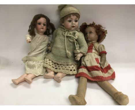 Three composition dolls including a bisque headed BP doll.