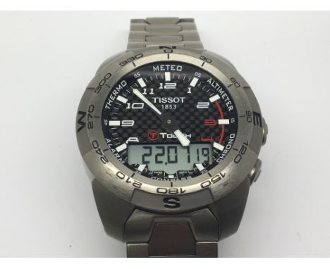 A Gents Tissot Touch Expert Watch with digital display. Seen working.