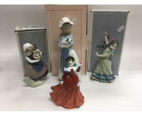 Two boxed Lladro figures, a boxed Nao figure and a Royal Doulton figure 'Winter's Day' (4).