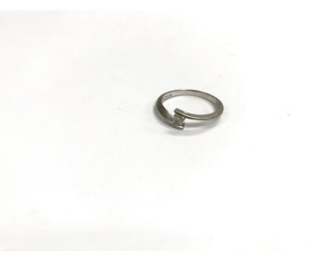 An 18ct white gold ring set with a diamond. Size approx P/Q, weight approx 3g.