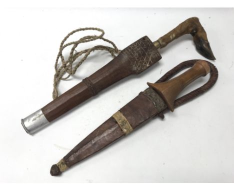 A pair of vintage native knives in wooden sheaths; one with small deer leg handle.
