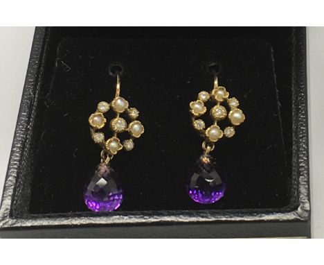 A pair of Edwardian amethyst and seed pearl drop earrings