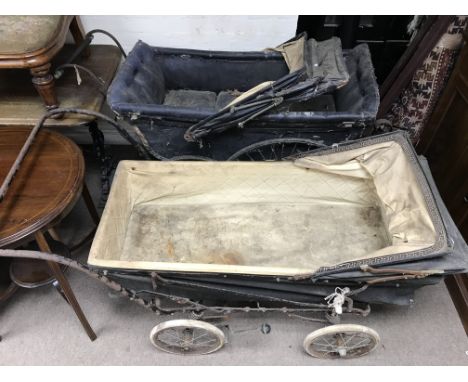 Two large vintage prams, in need of some repair.