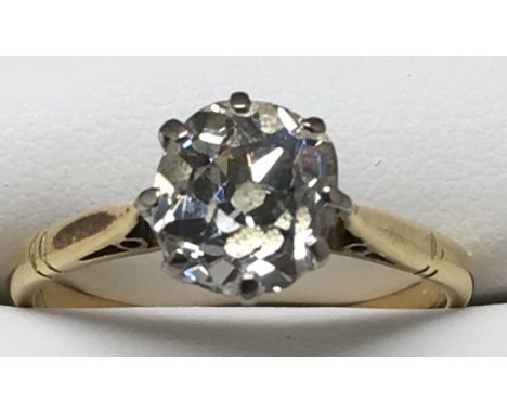 An unmarked yellow gold solitaire ring, set with approx 1.5ct diamond.Approx size L/K