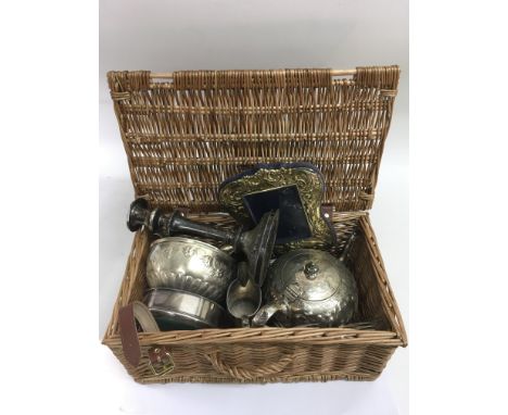 A Fortnum &amp; Mason wicker hamper containing silver plate including a teapot