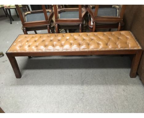 A mahogany button back bench, approx 153cm x 43cm x 40cm.