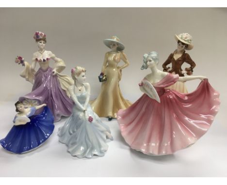 A collection of ceramic figures of ladies including Royal Doulton and Coalport (6).