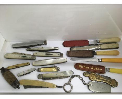 A small group of penknives including some silver and mother of pearl