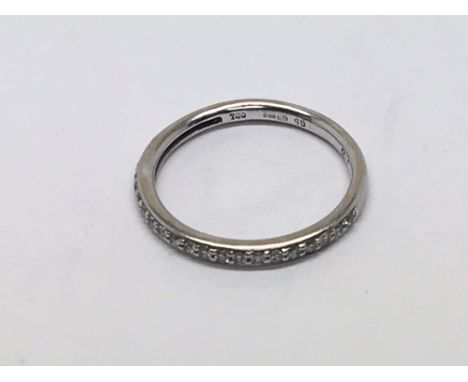 An 18carat white gold half hoop eternity ring set with diamonds ring size H.