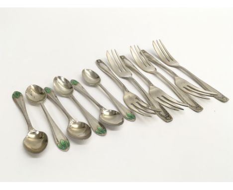 A cased set of silver and enamel spoons, hallmarked for Thomas Bradbury &amp; Sons Ltd of Shefffield, alongside a cased set o