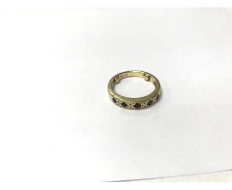 An 18ct five ruby ring. Size approx Q, weight approx 6.6g