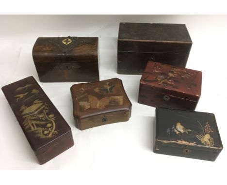 A  walnut casket shape tea caddy with applied metal mount, one other tea caddy and  four lacquer boxes, some a/f