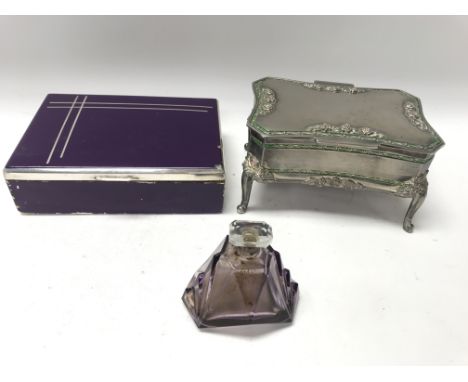 An Art Deco style cigarette box in purple enamel along with a chrome and silver plated jewellery box together with a small Ar