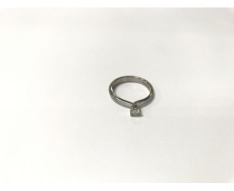 An 18ct white gold diamond solitaire ring with 'Beaverbrooks' certificate. Colour I, clarity I1 and carat weight 0.26. Weight