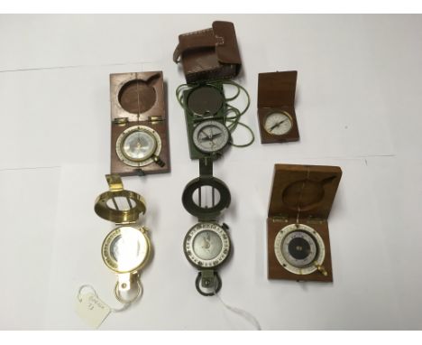 A collection of 6 vintage compasses to include a Barker M73 and Stanley 150