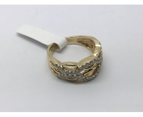 An unusual diamond set ring, approx 6.3g and approx size Q-R.