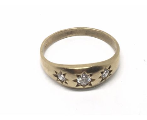 A 9carat gold ring set with three brilliant cut diamonds. Ring size R-S.