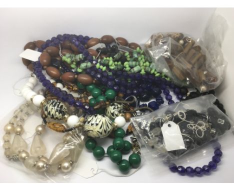 A bag of vintage bead necklaces.