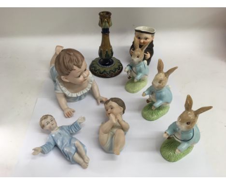 Three Beswick Beatrix Potter bunnies, a Doulton candlestick, Goebel monk and three bisque babies