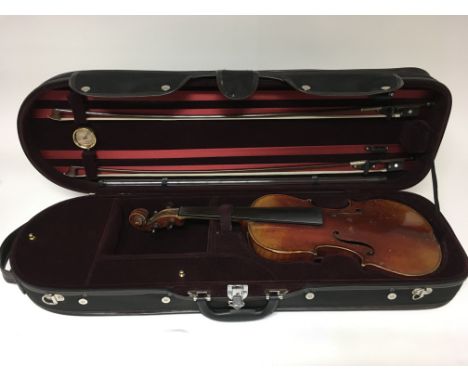 A useful antique German violin, possibly Schoenbach school, circa 1900 in need of refurbishment with a violin and viola bow, 