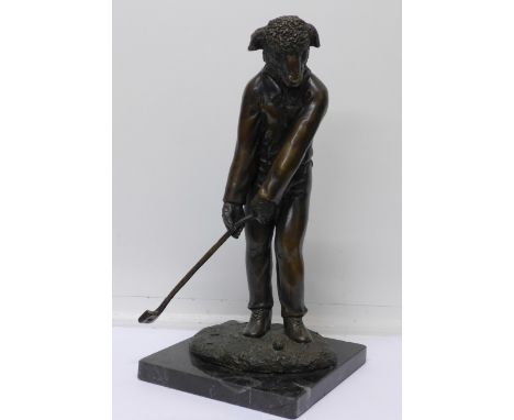 A novelty bronze figure of a golfer, 40cm
